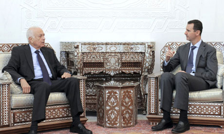 Syrian President Bashar Assad, right, meets with Arab League Secretary ...
