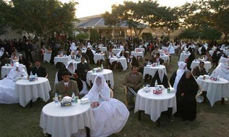 child wedding iraq iraqi mass claims sparks fury marriage bill over ahram baghdad organized hilla newlyweds involving sit ceremony couples