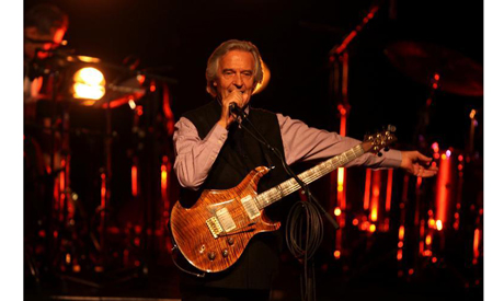 British Jazz musician John McLaughlin performs with 4th Dimension at a concert in the West Bank city
