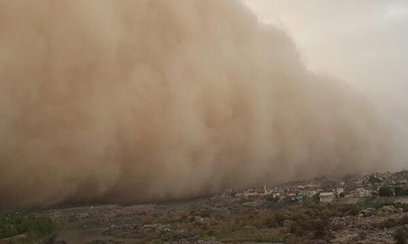 A massive sandstorm cloud rolls over Aswan