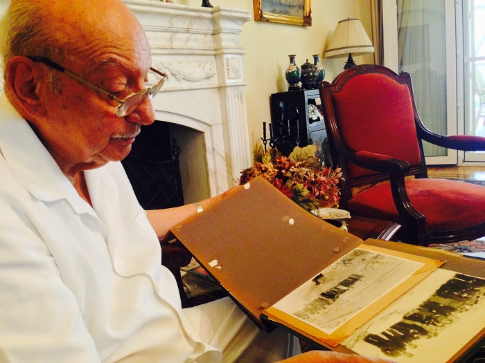 Ambassador Ahmed Hassan with old Album of his father Selim Hassan