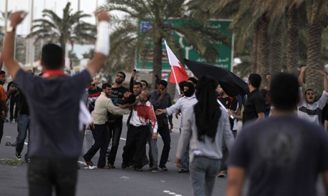 Anti-government protester shot 18 Feb 2011. (AP)
