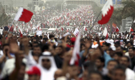 Bahraini anti-government protesters displaying national flagsm, Feb. 25, (AP).