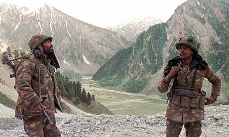 Indian soldiers keep guard over the mountains in Sonamarg, Kashmir