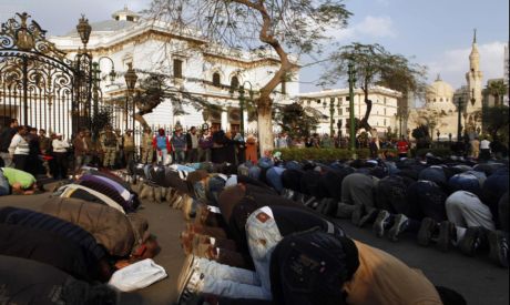 Anti-Mubarak protestors pray in front of the parliament in Cairo February 8, 2011. (Photo by: Reuter