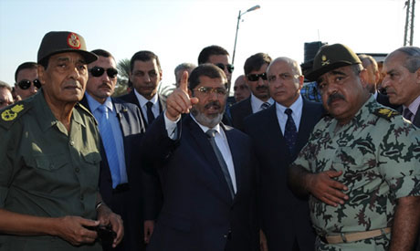 Morsi in Suez to attend military parade