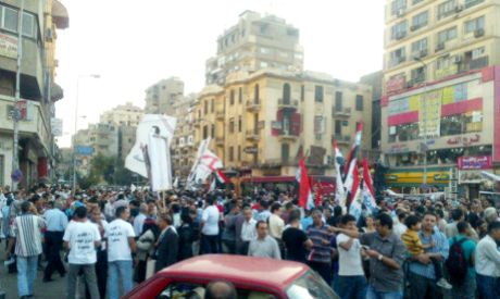 Thousands gather in Dawaran Shubra square to start marching towards state TV headquarters in Maspero