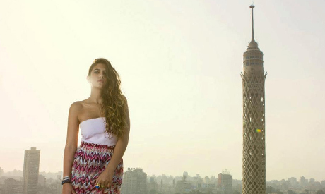 Designer Şirin Arafa promotion with Cairo tower in background