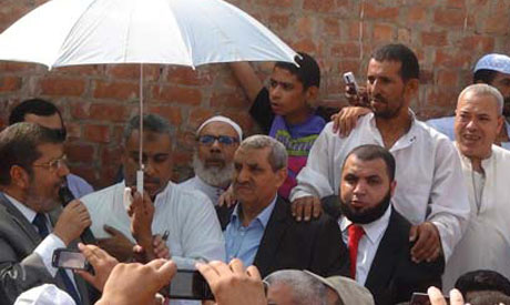 Morsi at mic (Photo: Ahram)