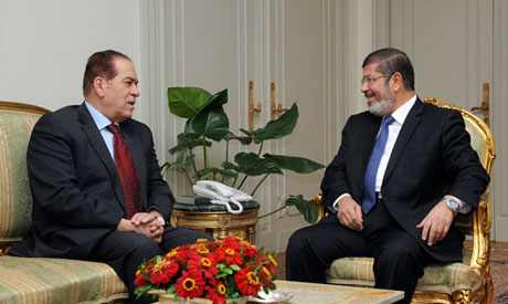 Morsi and Ganzouri