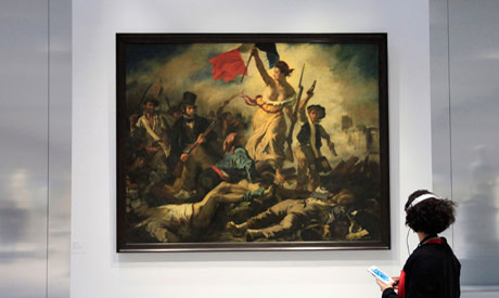 A woman looks at Eugene Delacroix 