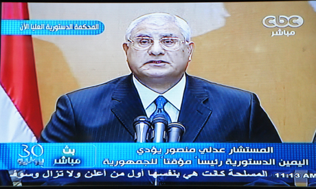 Interim President Adly Mansour