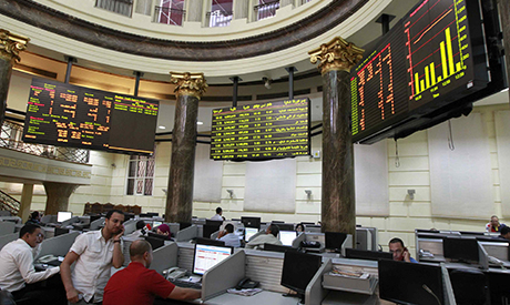 Traders work at the Egyptian stock exchange in Cairo July 4, 2013