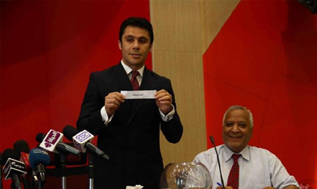 Ahmed Hassan conducts the draw