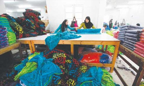 Women work at a textile mill in Mahalla