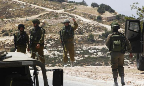Israeli soldiers patrol 
