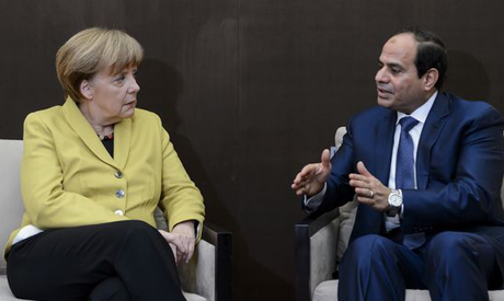 A file photo of President Abdel Fattah el-Sisi with German Chancellor Angela Merkel at the World Eco