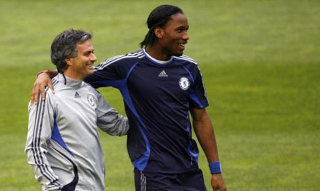 Chelsea manager Jose Mourinho (L) and Didier Drogba