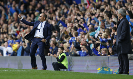 Everton manager Roberto Martínez celebrates their second goal with Chelsea manager Jose Mourinho