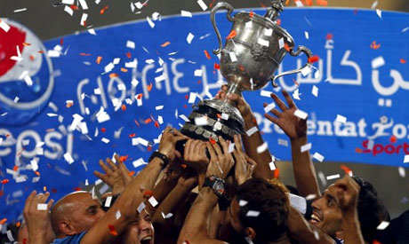 Zamalek celebrate with the trophy after winning their Egyptian Cup finals derby soccer match against