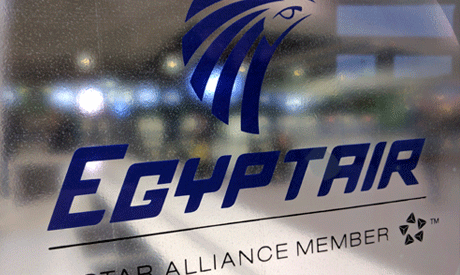 A frosted glass partition is seen at the EgyptAir counter (AP)