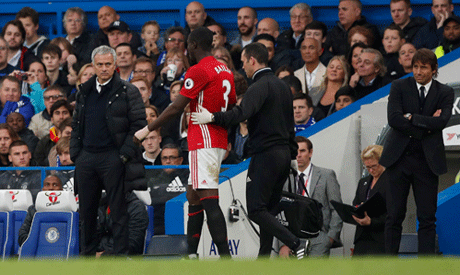 Manchester United manager Jose Mourinho looks at Eric Bailly as he comes off injured (Reuters)