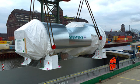 The first gas turbines for the largest order in Siemens’ history are leaving Berlin’s Westhafen. (Ph