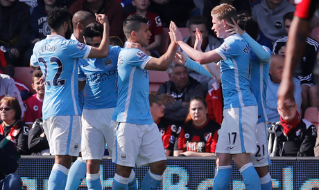 Sergio Aguero celebrates scoring the third goal for Manchester City (Reuters)