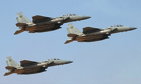 Warplanes of the Saudi Royal air force are seen flying in formation over the Riyadh military airport