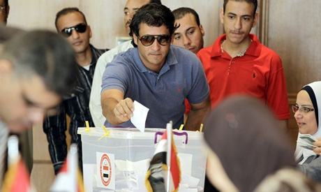 Egyptians cast their ballot in the early voting for the presidential elections on 2014 (AFP)