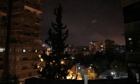 Anti-aircraft fire is seen over Damascus,Syria early April 14, 2018