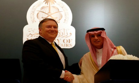 US Secretary of State Mike Pompeo shakes hands with his Saudi counterpart Adel al-Jubeir during a ne