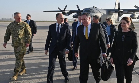 U.S. Secretary of State Mike Pompeo is welcomed by U.S. ambassador to Iraq Douglas Silliman as he ar