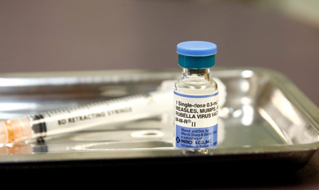 A vial of the measles, mumps, and rubella (MMR) vaccine is pictured at the International Community H