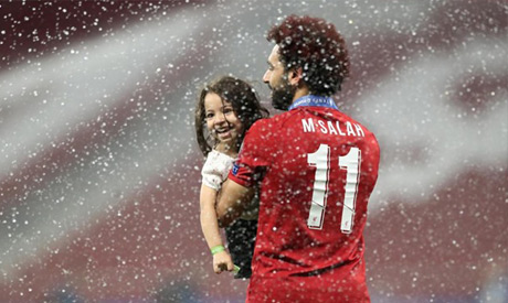 Mohamed Salah celebrates with his daughter after winning the Champions League Final (Reuters)