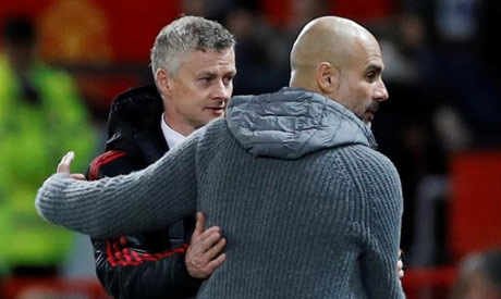 Manchester City manager Pep Guardiola and Manchester United manager Ole Gunnar Solskjaer (Reuters)