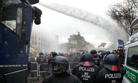 Berlin police forcefully disperse virus protesters