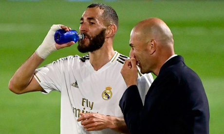 Zinedine Zidane (right) says Karim Benzema (left) is the complete package for Real Madrid. (AFP)