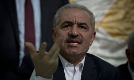 Palestinian Prime Minister Mohammad Shtayyeh speaks during the leadership meeting to discuss the Isr