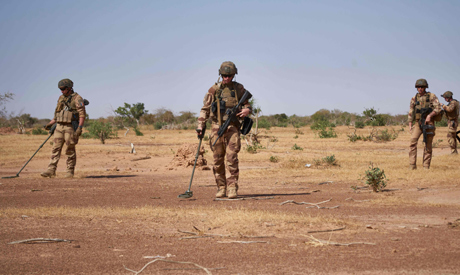 File photo taken on November 12, 2019 Soldiers from the French Army holds  detectors while searching