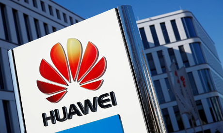 FILE PHOTO: The logo of Huawei Technologies is pictured in front of the German headquarters of the C