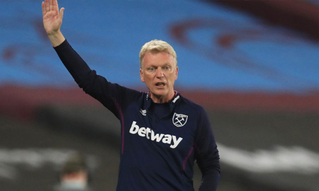 West Ham United manager David Moyes celebrates after the match , as play resumes behind closed doors