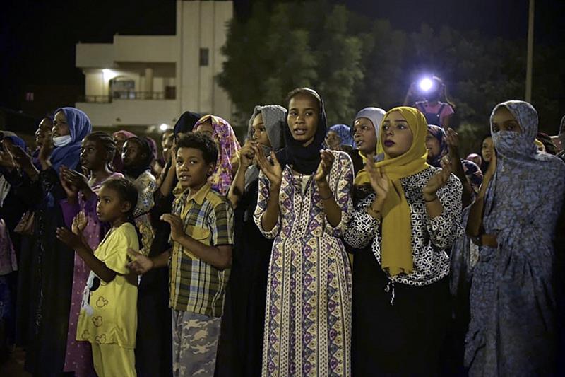 Sudanese youths take part in a protest in the capital Khartoum