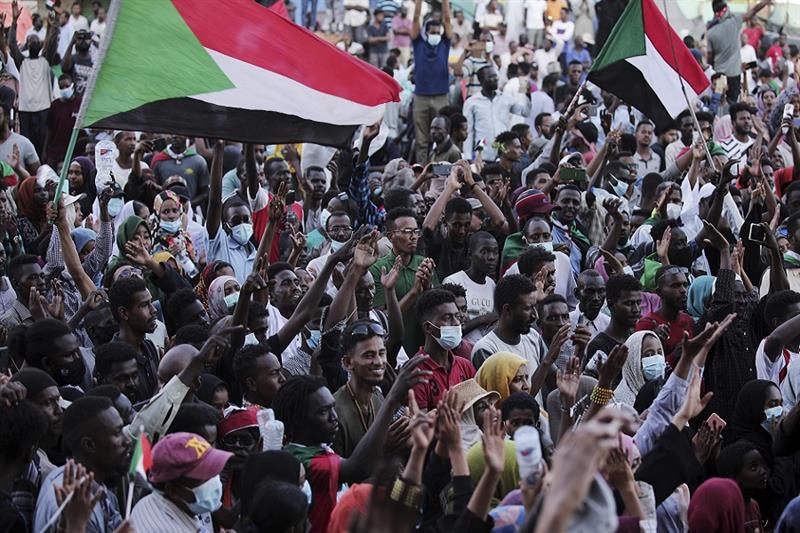 People chant slogans during a protest in Khartoum, Sudan, Saturday, Oct. 30, 2021. (AP Photo)