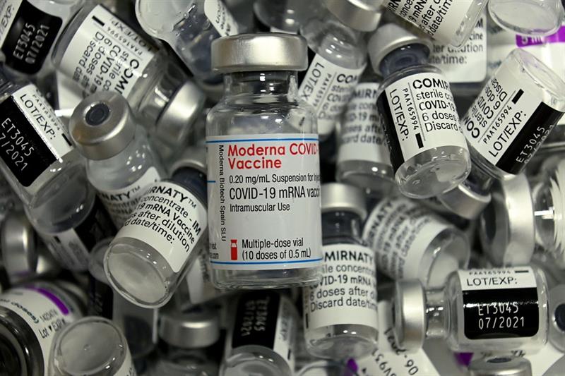 (FILES) This file photo taken on April 20, 2021 shows an empty vial of the Moderna Covid-19 vaccine 