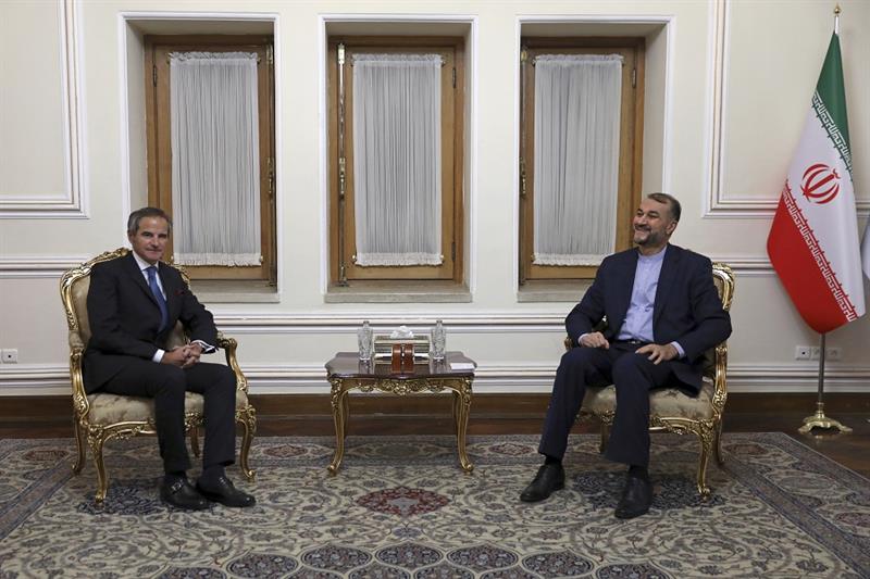 Head of the  IAEA, Rafael Mariano Grossi, left, and Iranian Foreign Minister Hossein Amirabdollahian