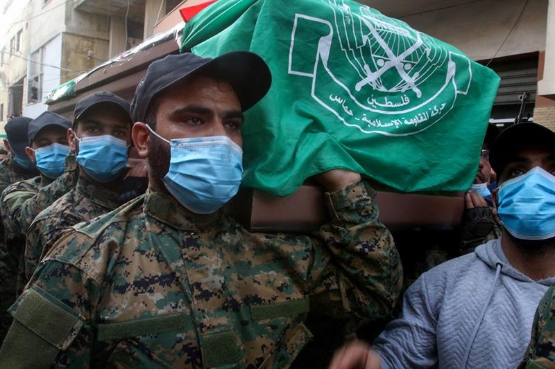 Hamas fighters at a funeral 