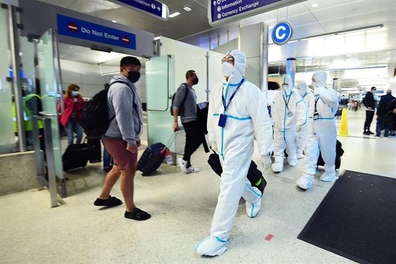 Air China crew in hazmat suits at LAX