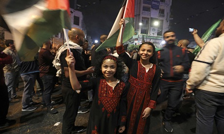 Palestinians celebrate in Ramallah city center AFP