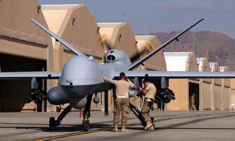 File photo: U.S. airmen prepare a U.S. Air Force MQ-9 Reaper drone as it leaves on a mission at Kand